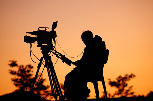 istock Silhouette of a TV cameraman 184901135