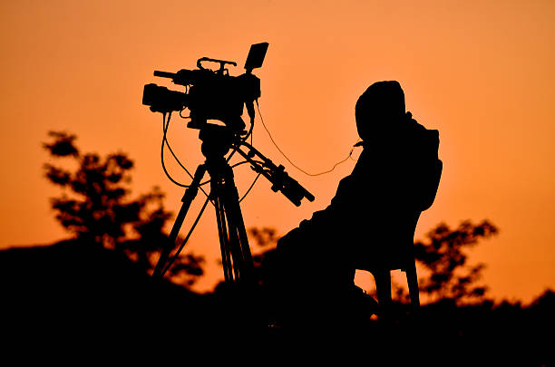 istock Silhouette of a TV cameraman 184901139