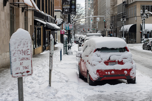 Portland, OR, USA - Feb 23, 2023: Street scene in downtown Portland, Oregon, after overnight snow storm.