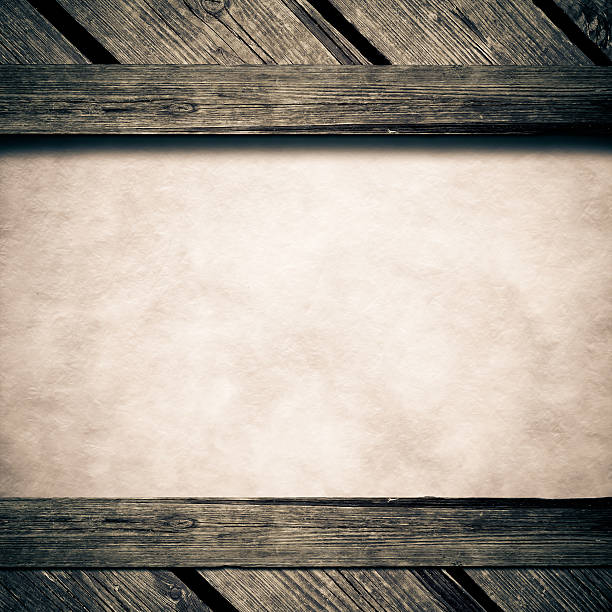 istock Paper sheet in middle of wood texture 184901415