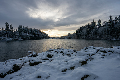 Willamette River on a cold winter morning after overnight snowfall.