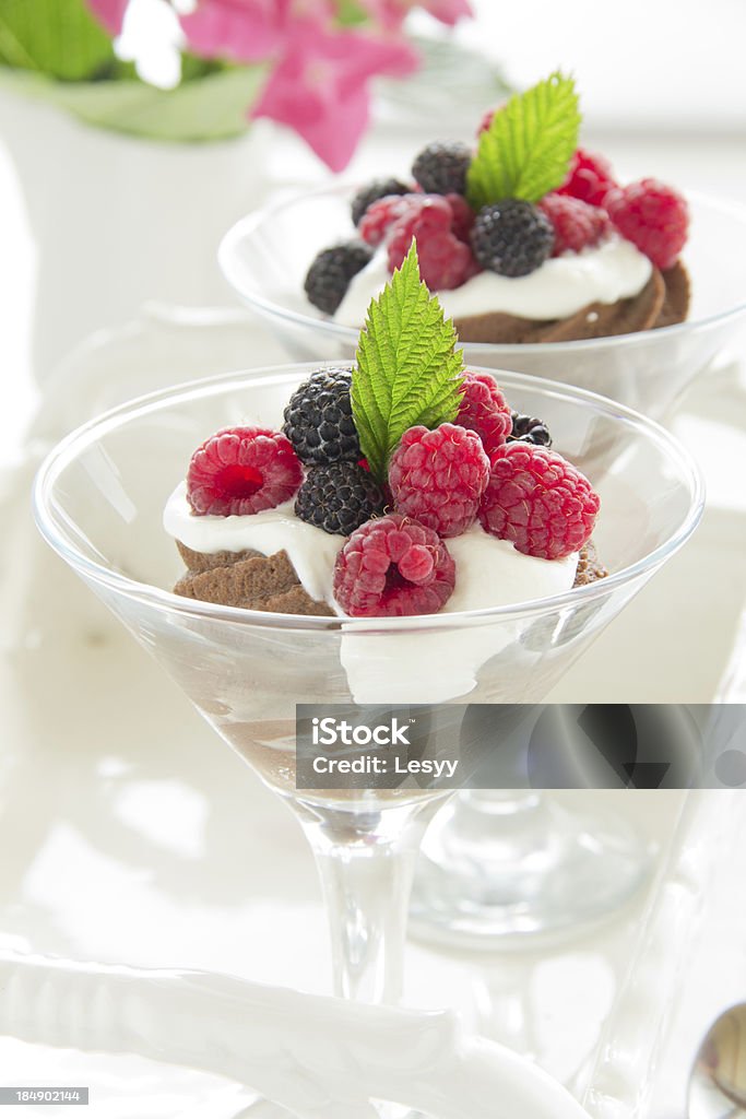 Chocolate mousse with raspberries and cream. Baked Stock Photo