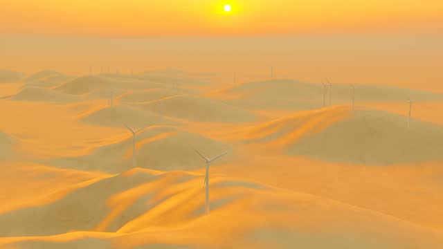Desert wind power windmill rotating scenery.