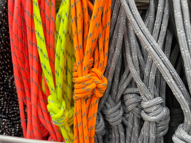 istock Multicolored athletic shoe laces in a row, close-up view. 1849028807
