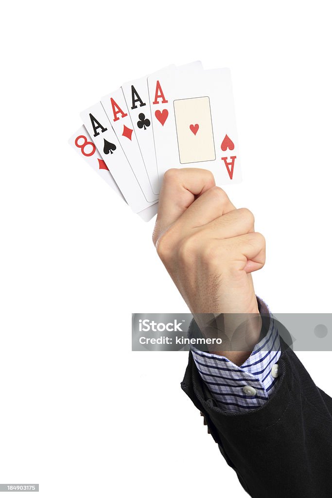 Four of a kind in hand Human Hand with poker hand "Four of a kind", Isolated on white background. Four of a kind is a poker hand that contains all four cards of one rank and any other (unmatched) card. Adult Stock Photo