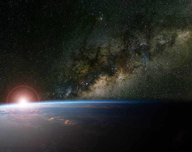 istock Sunrise and the Milky Way above planet Earth. 184905422