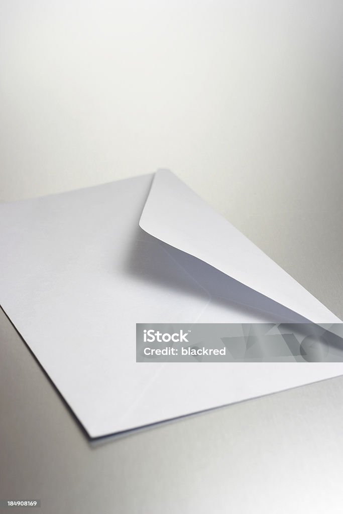 Envelop Close-up of a white envelop on chrome background.Similar images - Accessibility Stock Photo