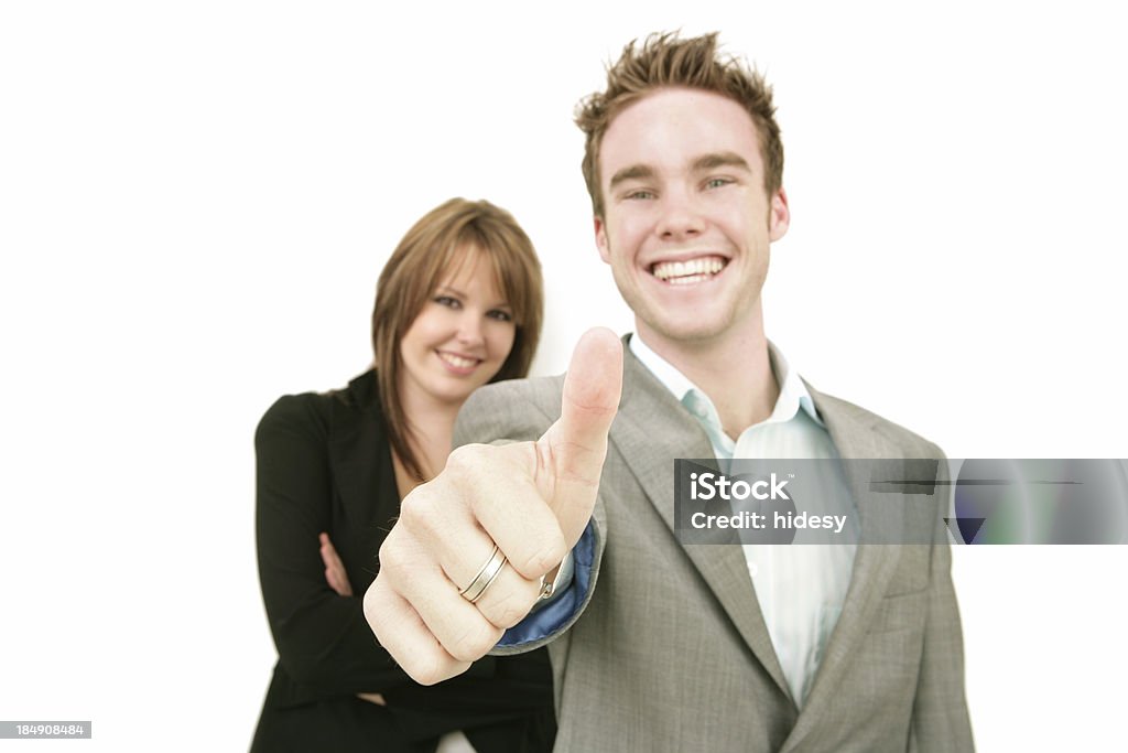 Success! Man and woman.  Focus on hand Men Stock Photo