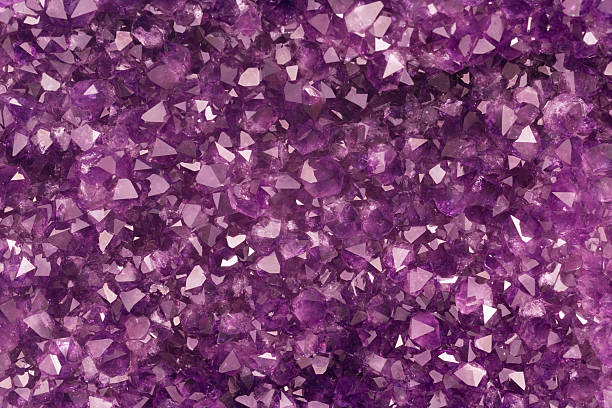 Amethyst crystal background template in purple stock photo