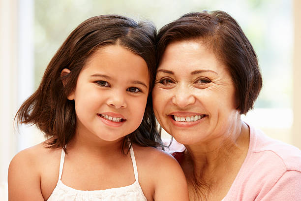 istock Hispanic grandmother and granddaughter 184908855