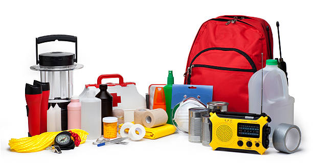 Disaster Emergency Supplies This is a photo of a variety of Emergency Supplies isolated on a white background.Click on the links below to view lightboxes. first aid kit stock pictures, royalty-free photos & images