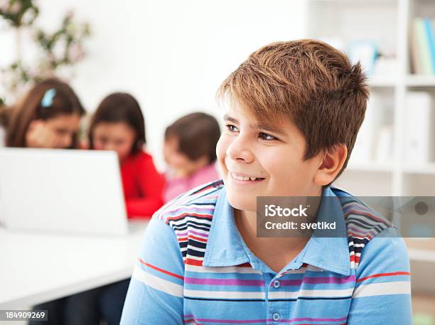 Smiling Boy In Classroom Stock Photo - Download Image Now - 12-13 Years, Boys, Child