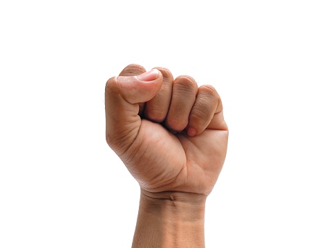 Male hands making fists isolated on a white background.
