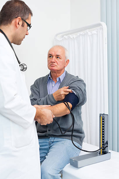istock Doctor checking blood pressure to a patient 184909365