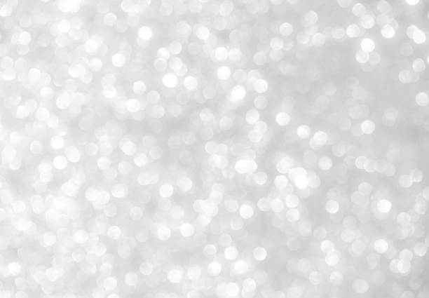 istock Bokeh Grey Effect Light Sparkle White Dust Golden Texture Glitter Glow Flare Spark Beige Pastel Gradient Abstract Blur Party Celebrate Blurry Mockup Holiday Frame Dreamy Backdrop Scene Snow Pattern. 1849094454