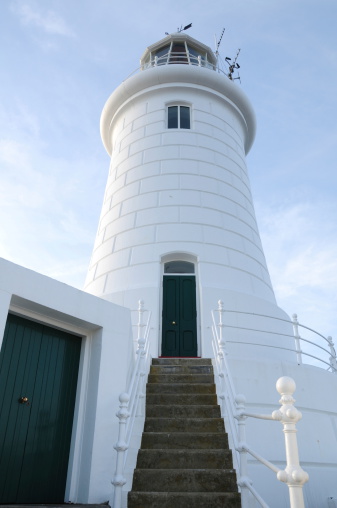 Wide angle image of Britain's most Southerly lighthouse first lit 1874.Also Britain's first concrete model.