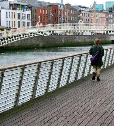 With Ha'Penny Bridge crossing the river. The bridge is named after the original old half penny toll required to cross to the other bank.Other images from Dublin:
