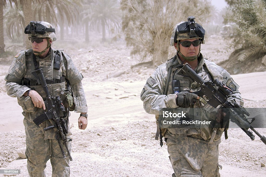 Soldiers Two U.S. Soldiers secure the landing zone for UH-60 Black-hawks. Army Soldier Stock Photo