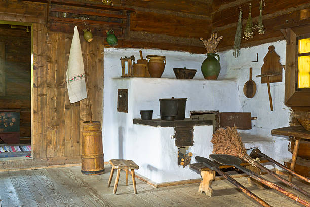Old Kitchen Interior "Interior in an old rural Kitchen with an old fashioned household items, SlovakiaSee more OLD INTERIORS images here:" butter churn stock pictures, royalty-free photos & images