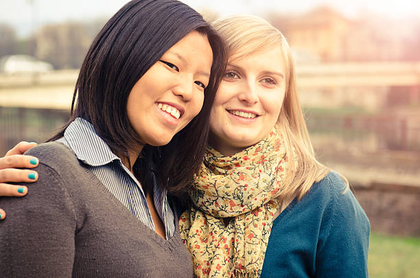 istock Multiracial couple embracing outdoors 184911435