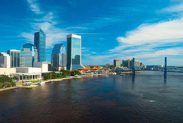 Jacksonville Skyline and Main Street Bridge aerial "(Elevated) Aerial view of the Jacksonville downtown skyline, St. Johns River, and the Main Street Bridge." st john's plant stock pictures, royalty-free photos & images
