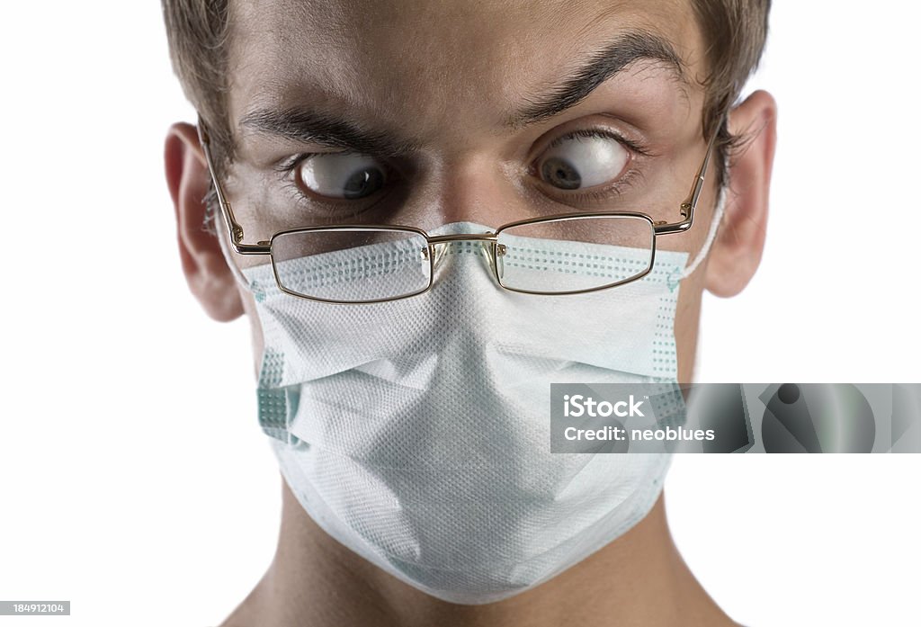 doctor in glasses The doctor in glasses on a white background. Ridiculous and grimacing Adult Stock Photo