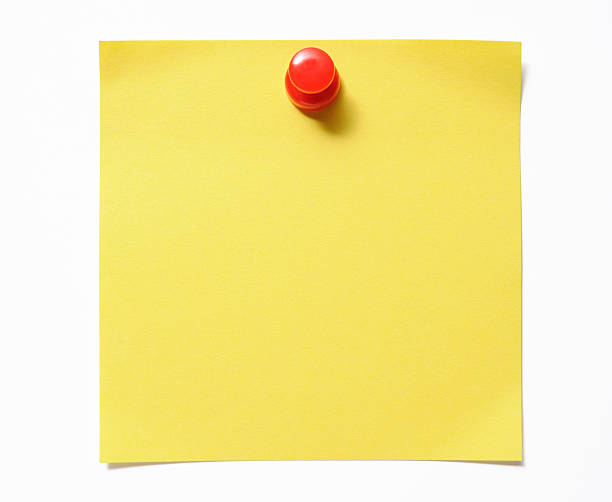 istock Isolated shot of blank yellow sticky note with red thumbtack 184912938