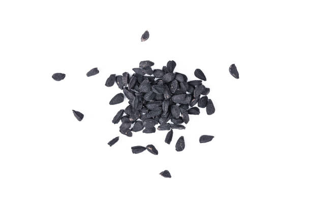cumin caraway black seeds macro, closeup isolated on white background stock photo