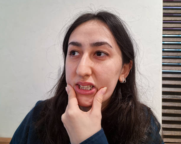 istock Young woman with has pain and teeth problem 1849131914