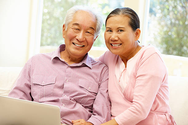 istock Senior Asian couple using laptop 184913518