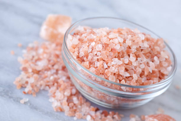 istock Himalayan Pink Salt in measuring cup 184914167