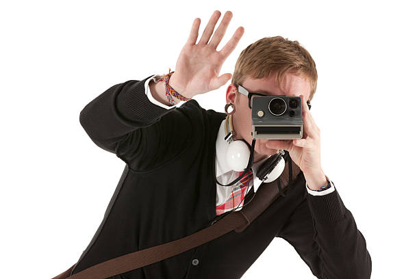 istock Man taking picture with a Polaroid camera 184915256