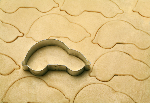 car shaped cookie cutter on dough