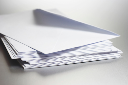 Close-up on a stack of white envelops.Similar images -