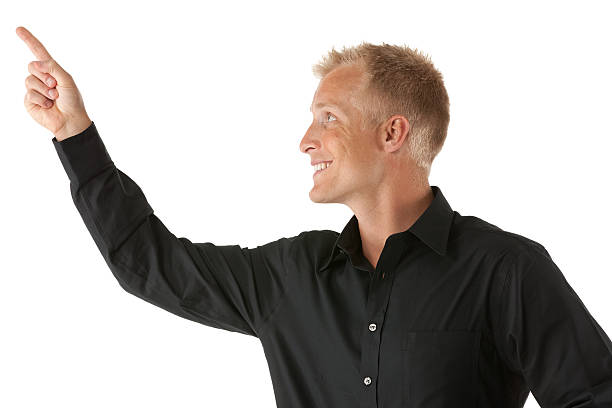 Young man points at the camera with a winning smile, I want you