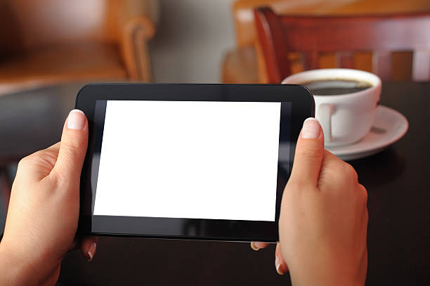 istock White screen tablet pc in a coffee shop 184916046