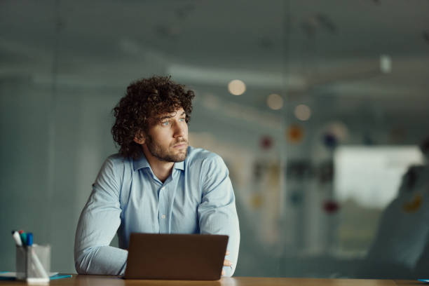 istock Thoughtful businessman working on laptop in the office. 1849160819
