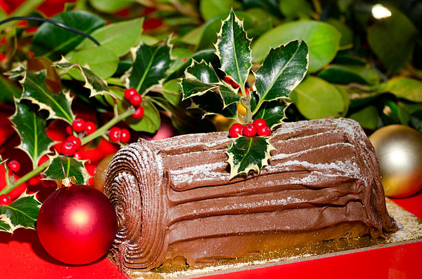 istock Chocolate Yule log with Christmas season background 184916317