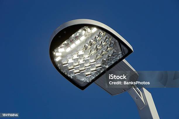Illuminated Led Streetlight Against A Clear Blue Sky Stock Photo - Download Image Now