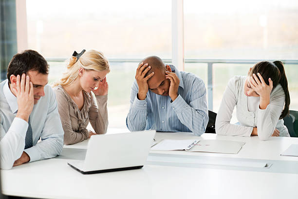 istock Group of stressful businesspeople having problems. 184917109