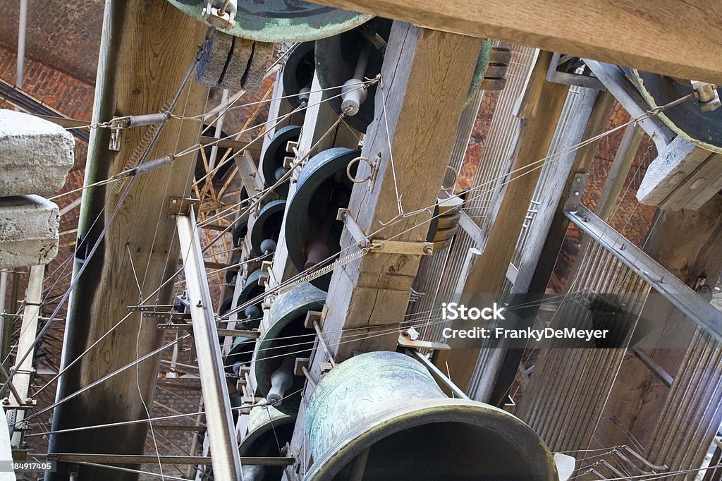 Carillon construction in the Belfry tower of Bruges "Detail of the huge carillon clocks/bells in the Belfry tower in Bruges, Belgium." Ancient Stock Photo