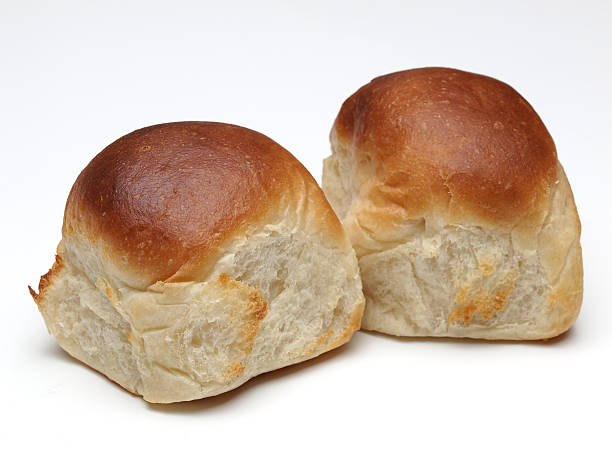 White dinner rolls Freshly Baked white bread dinner rolls bun stock pictures, royalty-free photos & images