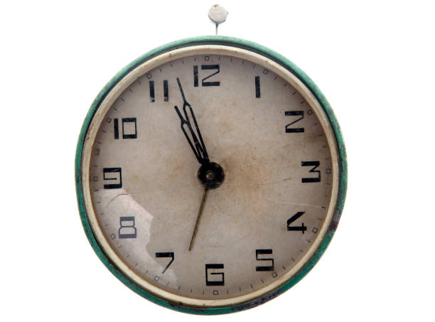 istock An old fashioned and worn out alarm clock 184917605