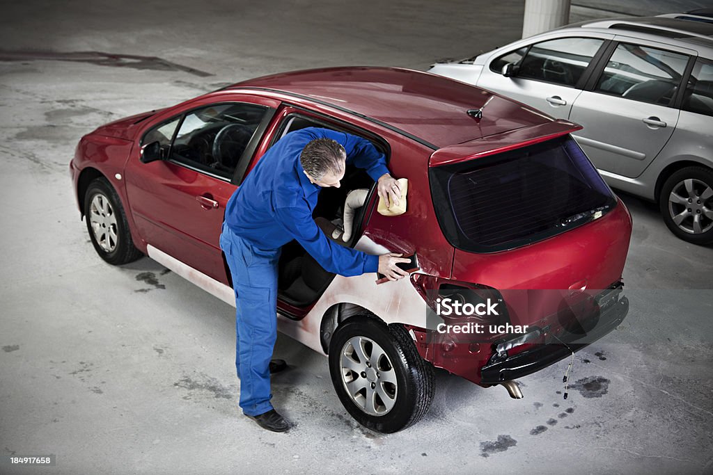 hood repair man hood repair manhood repair man Car Bodywork Stock Photo