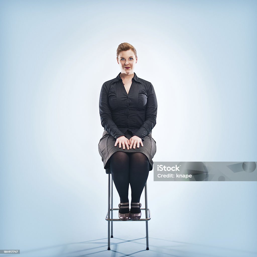 redhead on chair Full Length Stock Photo