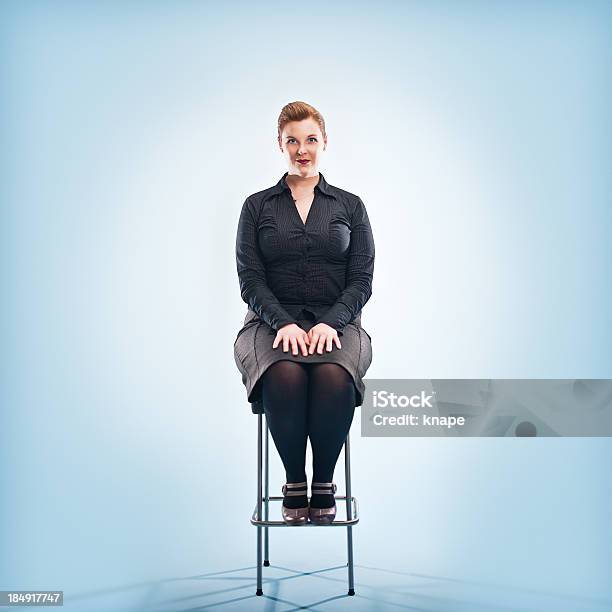 Redhead On Chair Stock Photo - Download Image Now - Full Length, One Woman Only, Studio Shot