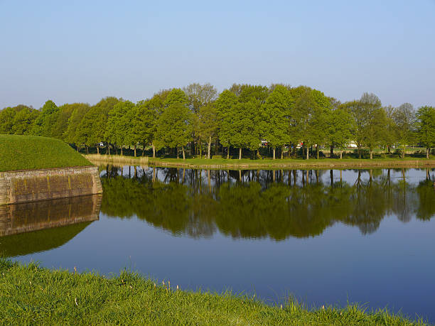 istock Dutch landscape with lake 184918327