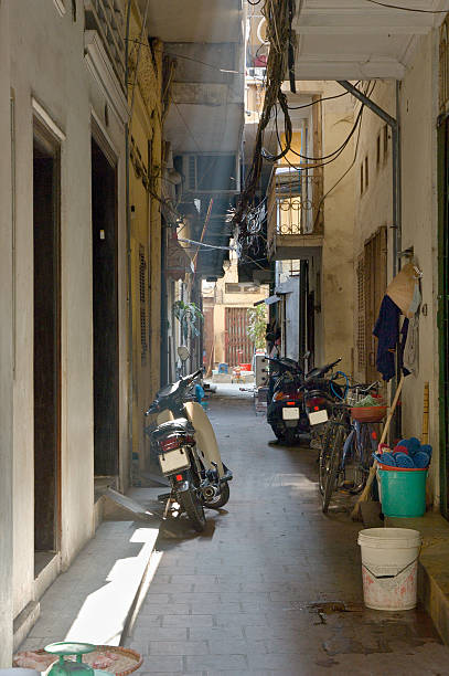 Motorcycles Parked In A Side Street