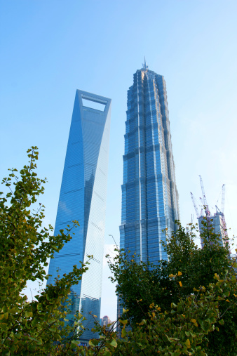 The Shanghai World Financial Center (left) and the Jin Mao Tower (right)