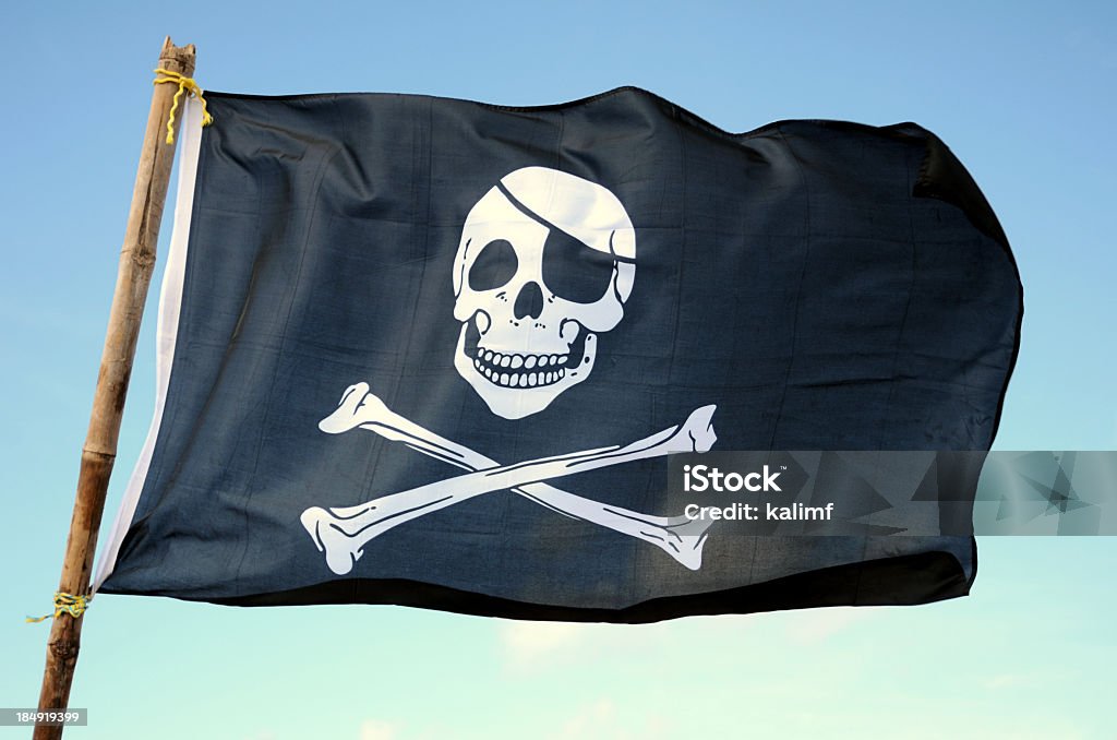 Bandera Pirata Foto de stock y más banco de imágenes de Bandera Pirata - Bandera  Pirata, Bandera, Bandera de piratas - iStock